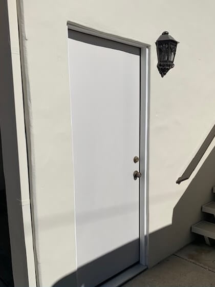 The same home after Bulldog replaced the doors