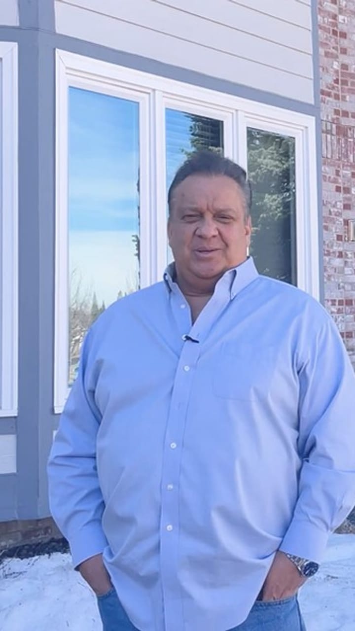 Andrew Foster, a Fort Mitchell homeowner, on his windows and doors installation