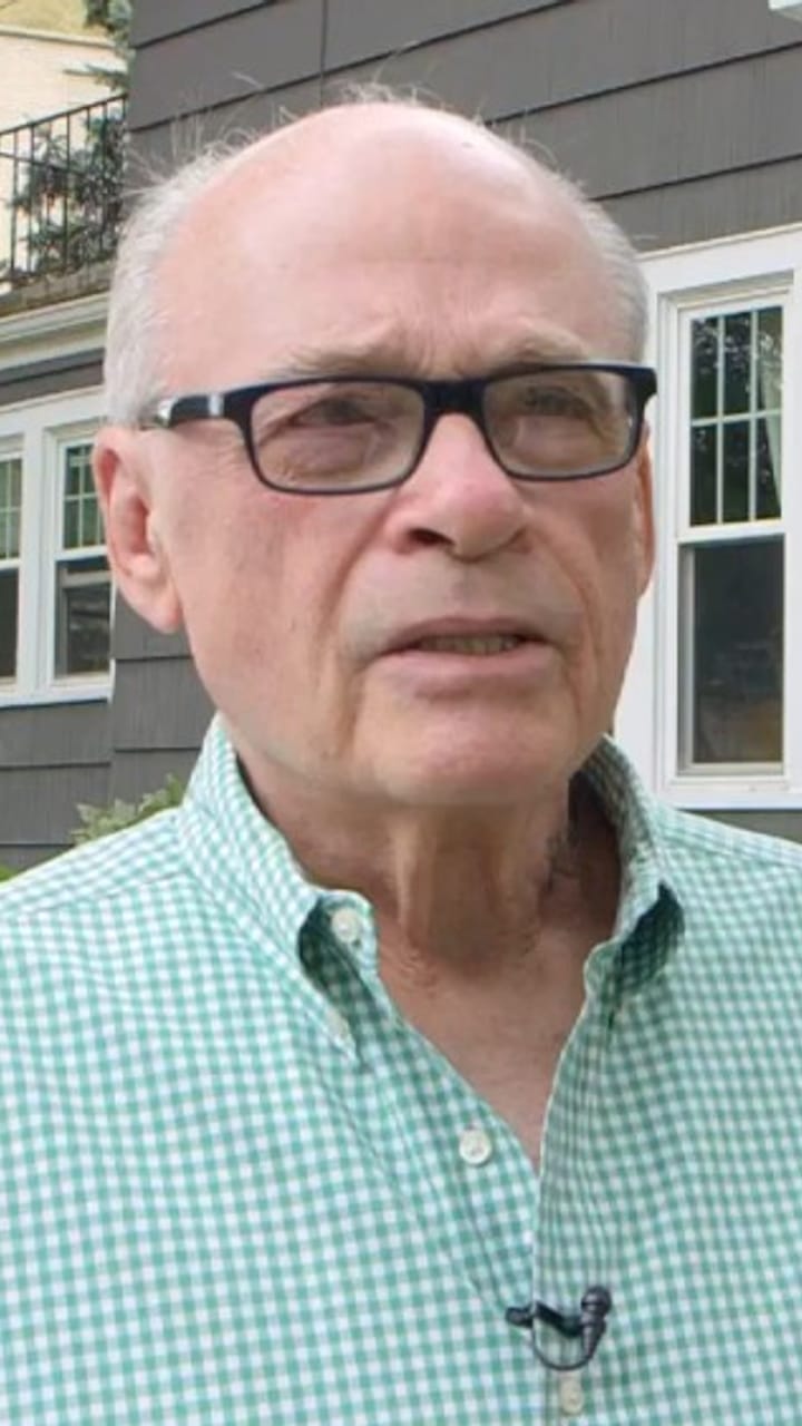 Matthew Collins, a Mason homeowner, on his door and windows installation