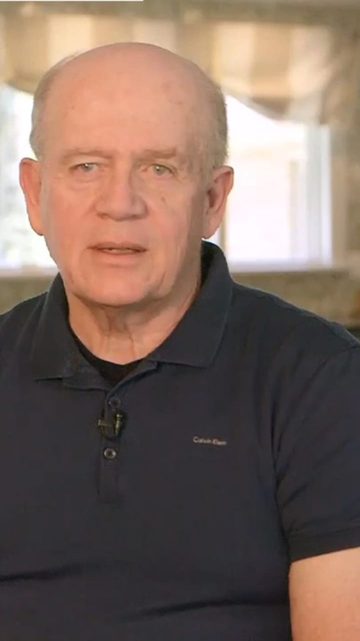 Nicholas Reed, an Erlanger homeowner, on his windows replacement
